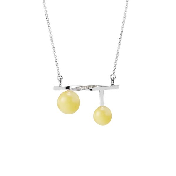 Balance Twist necklace by Bukkehave in milky amber